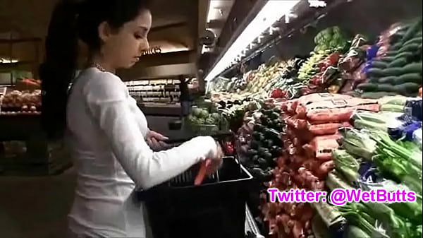 Teenage playing with carrot on the market. @WetButts